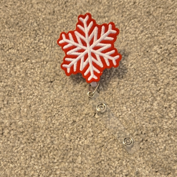 Red and White Snowflake Badge Reel - Picture 1 of 2